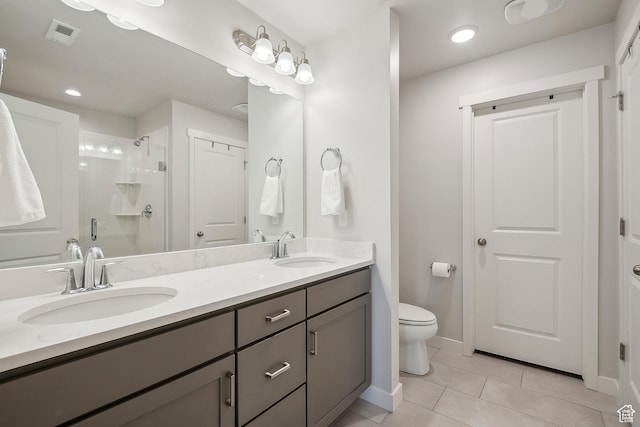 5991 Westridge Rd, Heber City, UT 84032 - bathroom featuring tile patterned floors, a stall shower, baseboards, and toilet