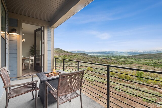 5991 Westridge Rd, Heber City, UT 84032 - balcony with an outdoor fire pit and a mountain view