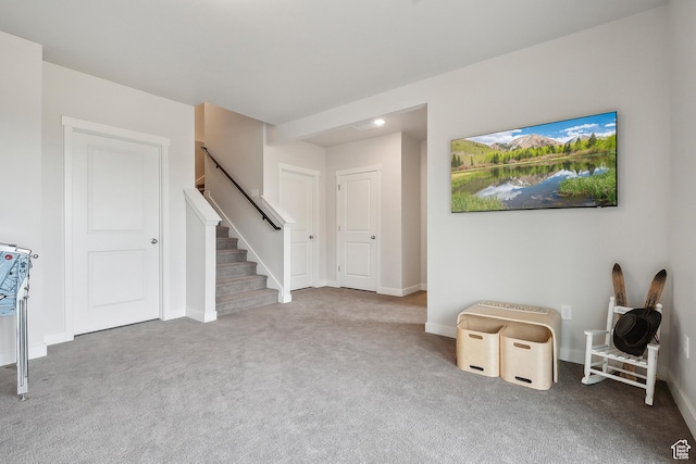 5991 Westridge Rd, Heber City, UT 84032 - unfurnished living room featuring carpet flooring, stairway, and baseboards