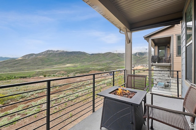 5991 Westridge Rd, Heber City, UT 84032 - balcony with a fire pit and a mountain view