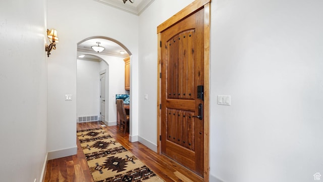 740 S Oak Dr, Woodland Hills, UT 84653 - entrance foyer with arched walkways, crown molding, light wood-type flooring, and baseboards