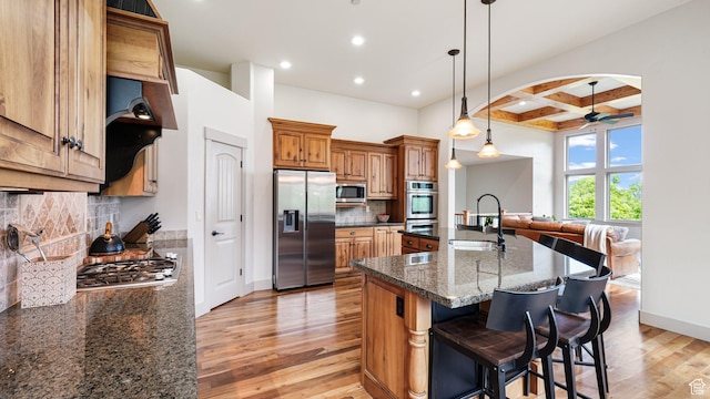 740 S Oak Dr, Woodland Hills, UT 84653 - kitchen featuring stainless steel appliances, a sink, coffered ceiling, light wood-style floors, and recessed lighting