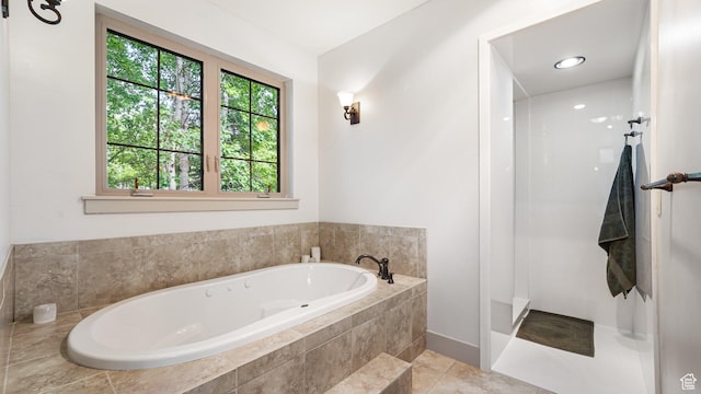 740 S Oak Dr, Woodland Hills, UT 84653 - bathroom featuring a bath, a walk in shower, and baseboards