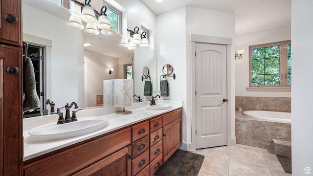 740 S Oak Dr, Woodland Hills, UT 84653 - bathroom with tile patterned floors, double vanity, a bath, and a closet