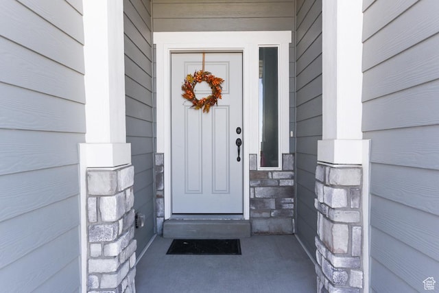 581 W 2030 N Unit 19A, Tooele, UT 84074 - entrance to property featuring covered porch and stone siding