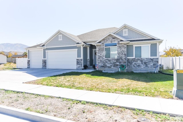 581 W 2030 N Unit 19A, Tooele, UT 84074 - craftsman house with stone siding, a garage, and concrete driveway