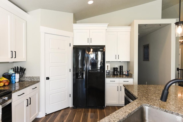 581 W 2030 N Unit 19A, Tooele, UT 84074 - kitchen with black fridge, dark stone countertops, dark wood-type flooring, white cabinets, and recessed lighting