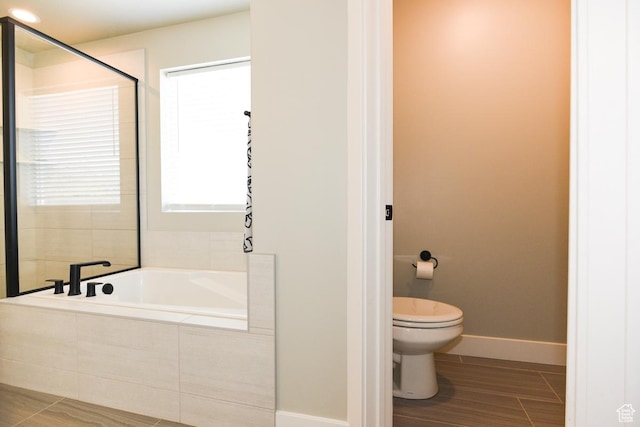 581 W 2030 N Unit 19A, Tooele, UT 84074 - full bathroom with a bath, toilet, baseboards, and a shower