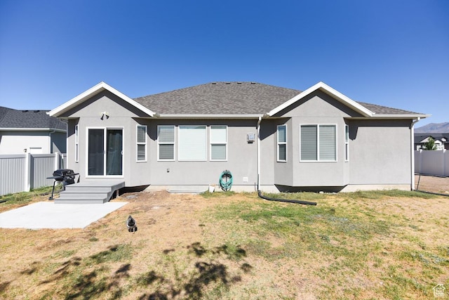 581 W 2030 N Unit 19A, Tooele, UT 84074 - ranch-style house featuring stucco siding, a patio, and roof with shingles
