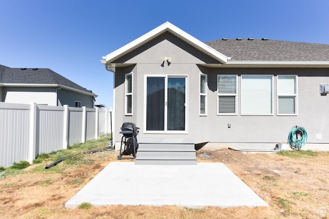 581 W 2030 N Unit 19A, Tooele, UT 84074 - back of property with a patio and stucco siding