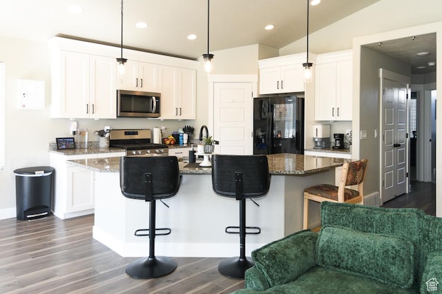 581 W 2030 N Unit 19A, Tooele, UT 84074 - kitchen with stainless steel appliances, dark wood-style flooring, baseboards, white cabinets, and recessed lighting