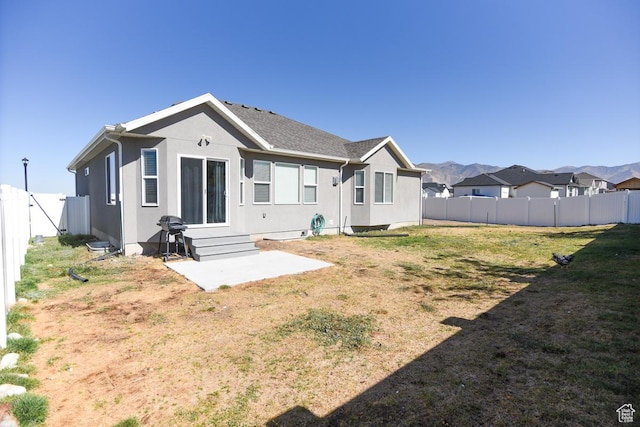 581 W 2030 N Unit 19A, Tooele, UT 84074 - back of house featuring a patio area and stucco siding