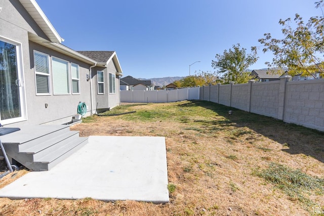 581 W 2030 N Unit 19A, Tooele, UT 84074 - view of yard featuring a patio