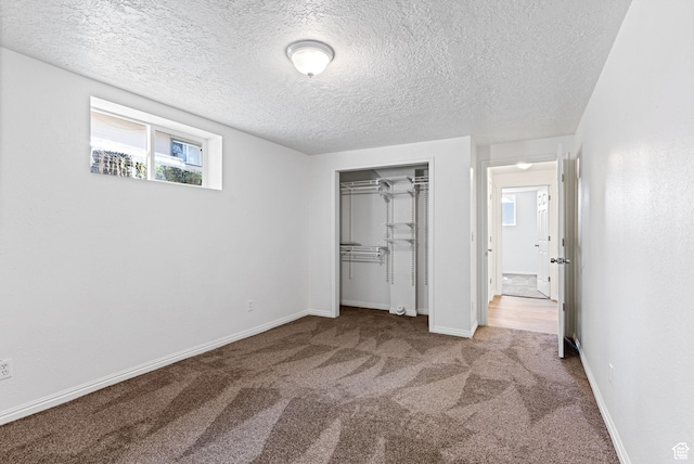333 S 100 W, Payson, UT 84651 - unfurnished bedroom featuring carpet flooring, a textured ceiling, a closet, and baseboards