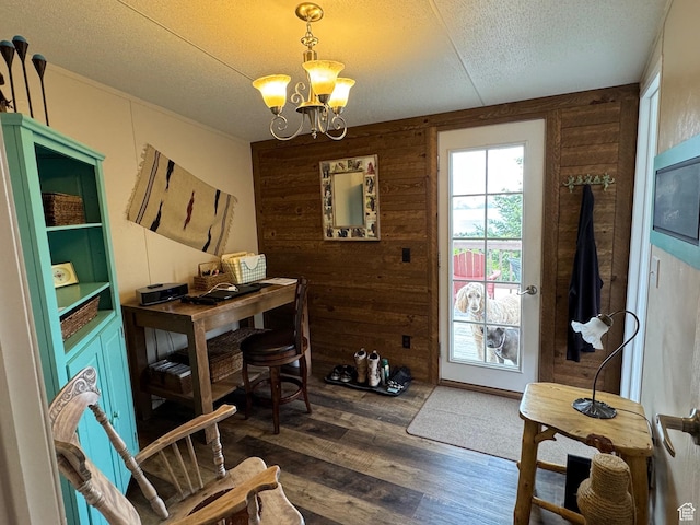 46 Alder Ct Unit 638, Fish Haven, ID 83287 - office space featuring a chandelier, dark wood-type flooring, wood walls, and a textured ceiling