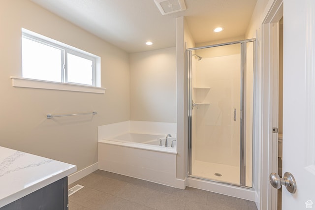 2205 S 1120 W Unit 62, Nibley, UT 84321 - bathroom with a stall shower, a bath, baseboards, vanity, and tile patterned floors