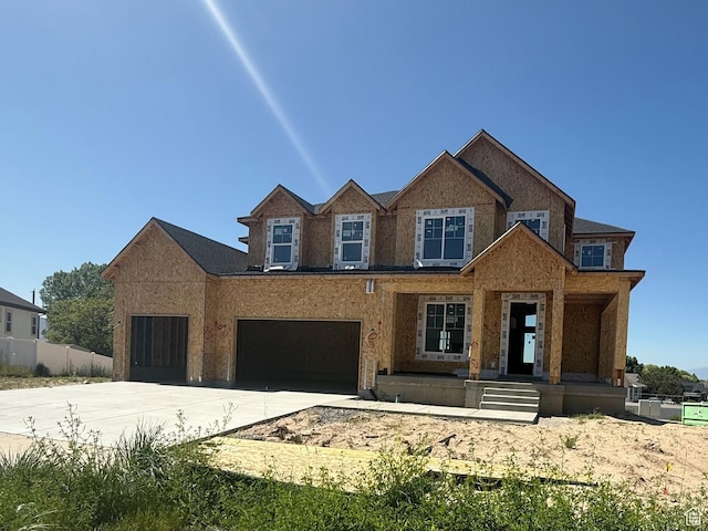 1046 S 650 W Unit 1, Salem, UT 84653 - view of front facade with driveway, an attached garage, and a porch