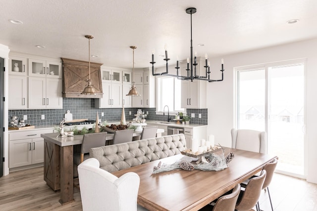 1046 S 650 W Unit 1, Salem, UT 84653 - dining space featuring light wood-type flooring, a chandelier, and recessed lighting