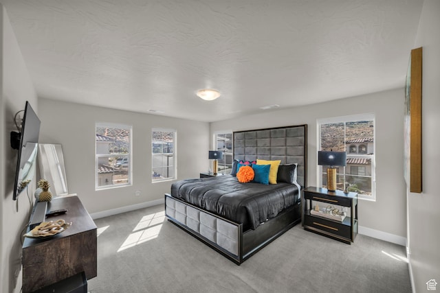 1189 N Bello Aly, Washington, UT 84780 - carpeted bedroom with baseboards and a textured ceiling