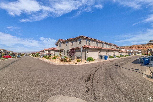 1189 N Bello Aly, Washington, UT 84780 - view of asphalt street with a residential view and curbs