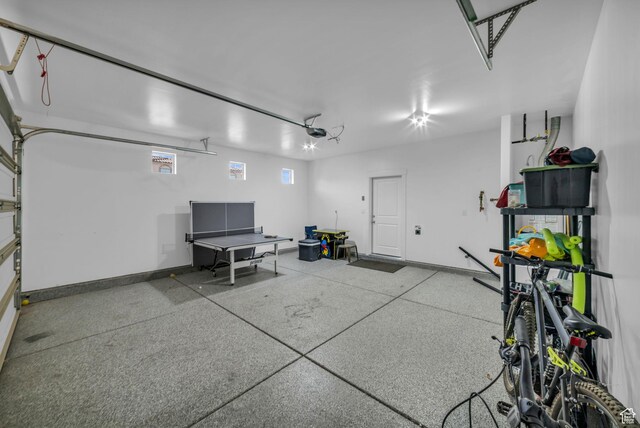 1189 N Bello Aly, Washington, UT 84780 - garage featuring a garage door opener and baseboards