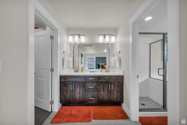 1189 N Bello Aly, Washington, UT 84780 - bathroom featuring a shower stall, double vanity, and tile patterned flooring