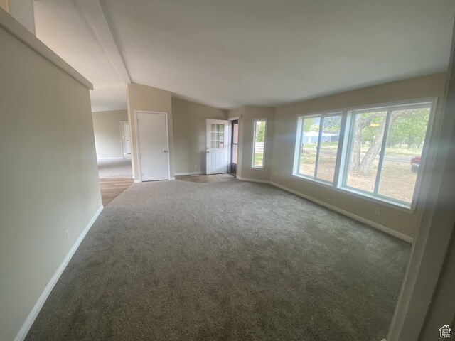 43 E 300 N, Duchesne, UT 84021 - spare room with baseboards, carpet, and lofted ceiling