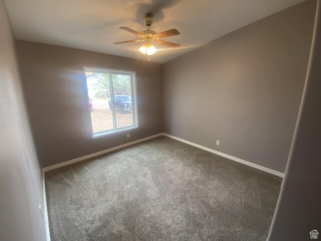 43 E 300 N, Duchesne, UT 84021 - empty room featuring a ceiling fan, dark colored carpet, and baseboards