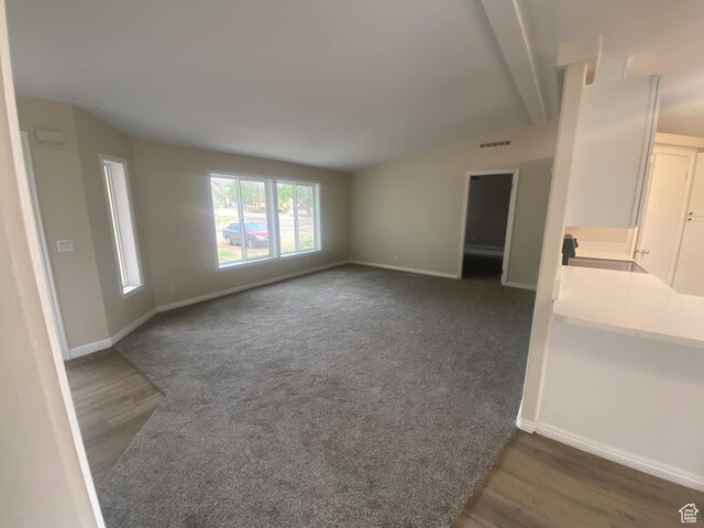 43 E 300 N, Duchesne, UT 84021 - unfurnished living room featuring baseboards and wood finished floors