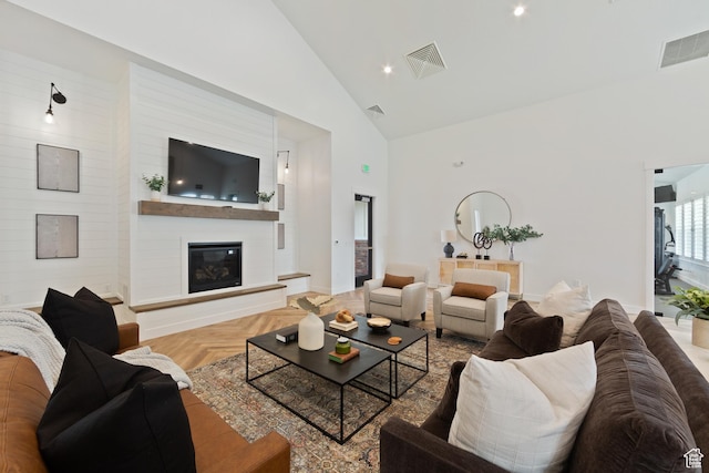 3564 W Haven Hollow Dr S, South Jordan, UT 84095 - living area with high vaulted ceiling, a large fireplace, baseboards, and recessed lighting