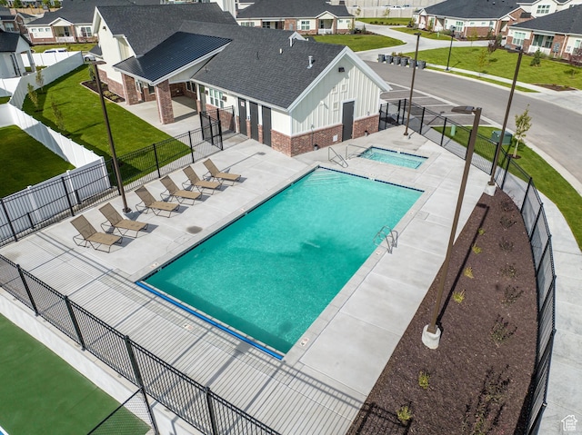 3564 W Haven Hollow Dr S, South Jordan, UT 84095 - community pool featuring a residential view, a patio, and a hot tub