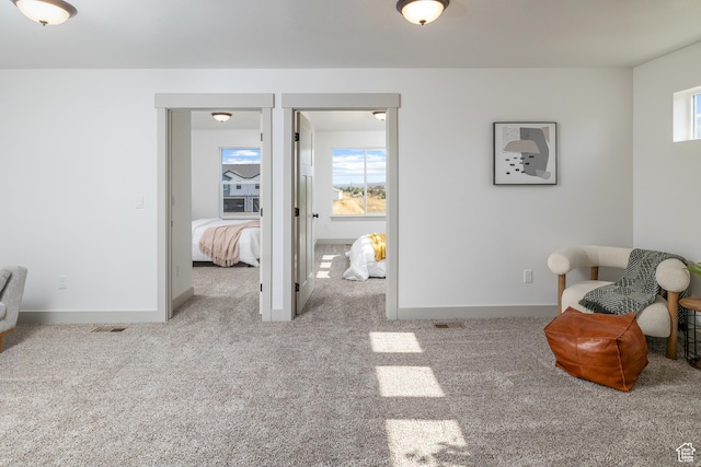 858 E 250 N, Hyrum, UT 84319 - sitting room with plenty of natural light, carpet floors, and baseboards
