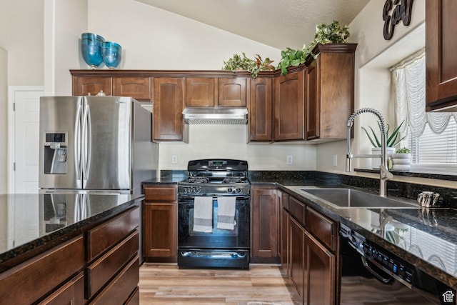 1044 S 1775 W, Syracuse, UT 84075 - kitchen with black appliances, under cabinet range hood, lofted ceiling, dark stone countertops, and a sink