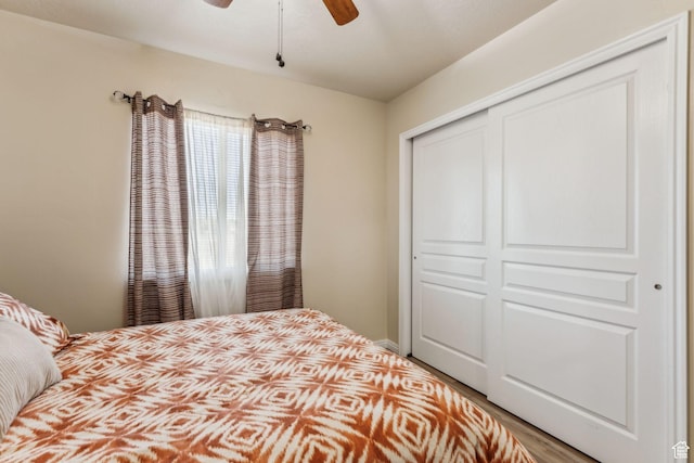 1044 S 1775 W, Syracuse, UT 84075 - bedroom featuring wood finished floors, a closet, and a ceiling fan