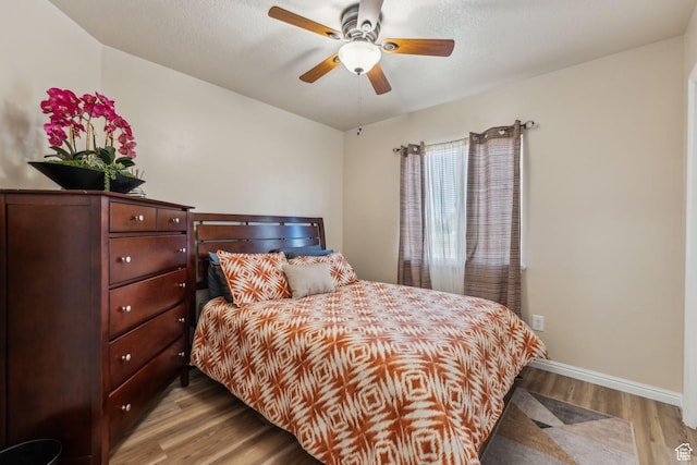 1044 S 1775 W, Syracuse, UT 84075 - bedroom with wood finished floors, baseboards, and a ceiling fan