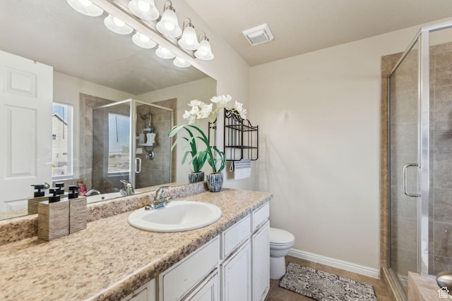 1044 S 1775 W, Syracuse, UT 84075 - bathroom with a shower stall, vanity, toilet, and tile patterned floors