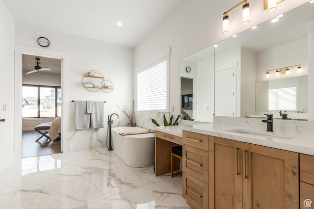 717 N Bridal Creek Ln E, Heber City, UT 84032 - ensuite bathroom with a freestanding bath, a ceiling fan, marble tiled flooring, vanity, and recessed lighting