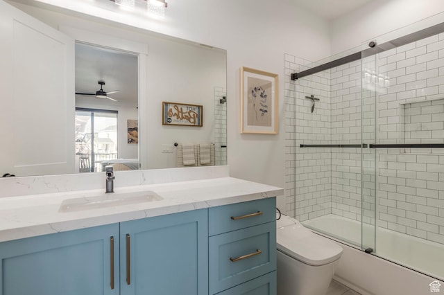 717 N Bridal Creek Ln E, Heber City, UT 84032 - bathroom featuring a ceiling fan, ensuite bathroom, vanity, bath / shower combo with glass door, and toilet