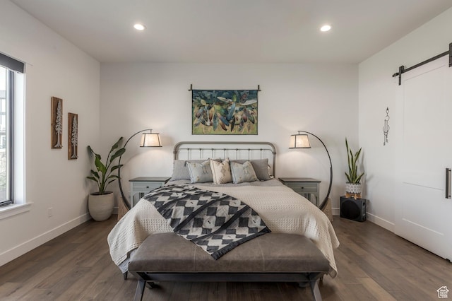 717 N Bridal Creek Ln E, Heber City, UT 84032 - bedroom with a barn door, recessed lighting, wood finished floors, and baseboards