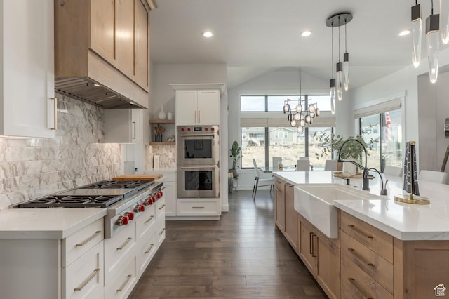 717 N Bridal Creek Ln E, Heber City, UT 84032 - kitchen with a sink, stainless steel appliances, dark wood-style flooring, decorative backsplash, and recessed lighting