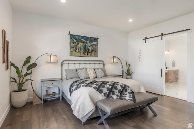 717 N Bridal Creek Ln E, Heber City, UT 84032 - bedroom with a barn door, recessed lighting, wood finished floors, baseboards, and connected bathroom