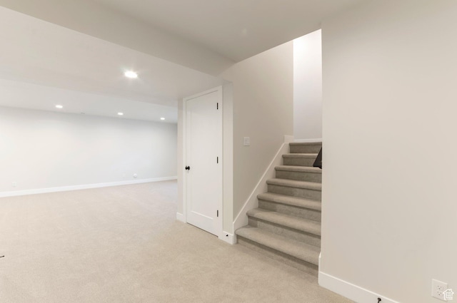 2133 N 725 W, Centerville, UT 84014 - finished below grade area with recessed lighting, stairs, carpet flooring, and baseboards