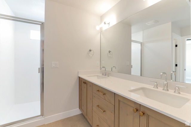 2133 N 725 W, Centerville, UT 84014 - bathroom featuring a shower stall, tile patterned floors, double vanity, and baseboards