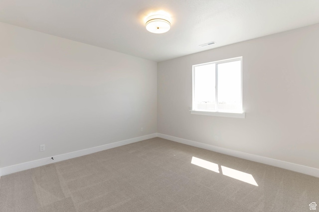 2133 N 725 W, Centerville, UT 84014 - spare room featuring light colored carpet and baseboards