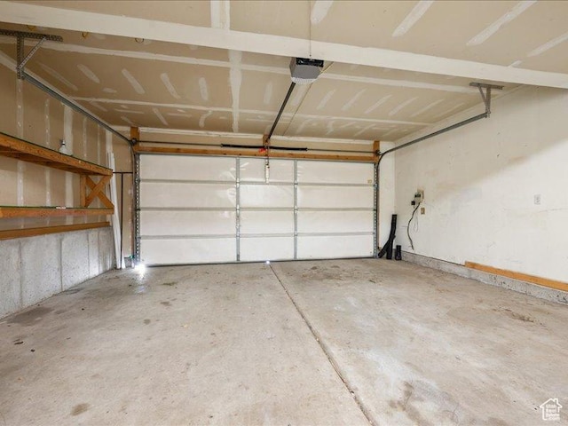 2014 S Jenny Ln, Clearfield, UT 84015 - garage featuring a garage door opener
