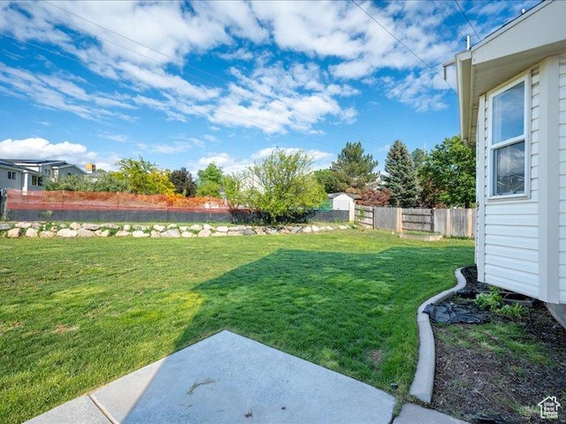 2014 S Jenny Ln, Clearfield, UT 84015 - view of yard featuring a patio