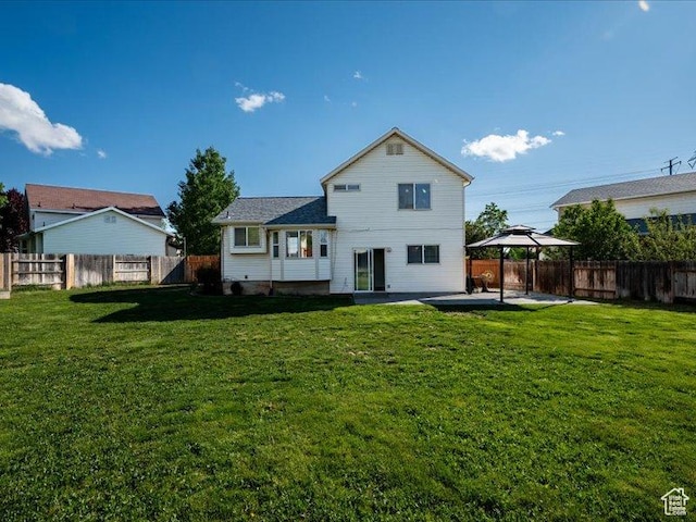 2014 S Jenny Ln, Clearfield, UT 84015 - back of house featuring a gazebo and a patio
