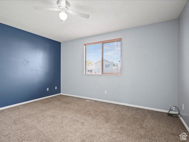 2014 S Jenny Ln, Clearfield, UT 84015 - carpeted spare room featuring baseboards and a ceiling fan