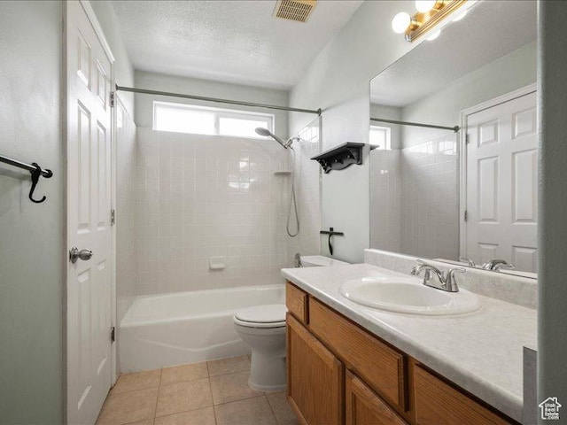 2014 S Jenny Ln, Clearfield, UT 84015 - full bath featuring vanity, toilet, tile patterned flooring, and bathtub / shower combination