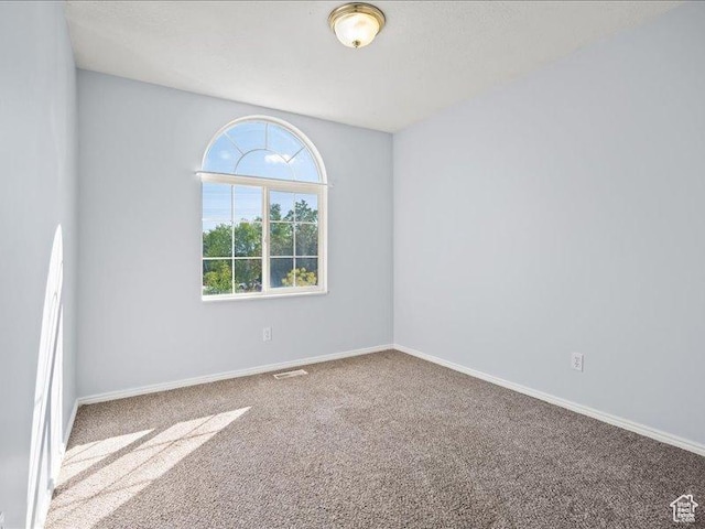 2014 S Jenny Ln, Clearfield, UT 84015 - spare room with carpet flooring and baseboards